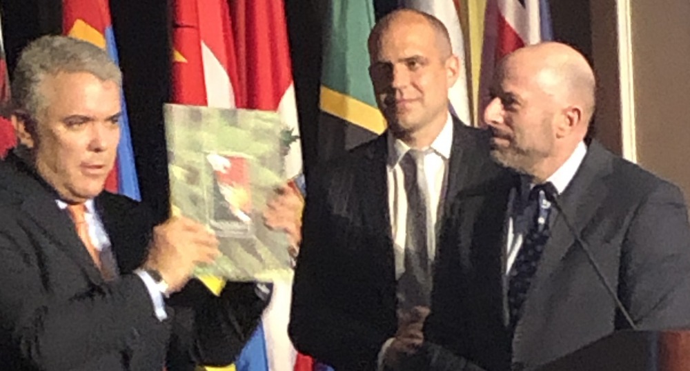 Rainforest Trust CEO, James Deutsch, stands at the podium with Colombian President H.E. Iván Duque Márquez.
