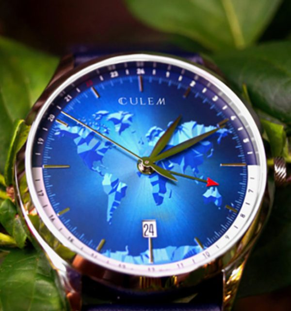 Watch with map of world in blue as a its face.