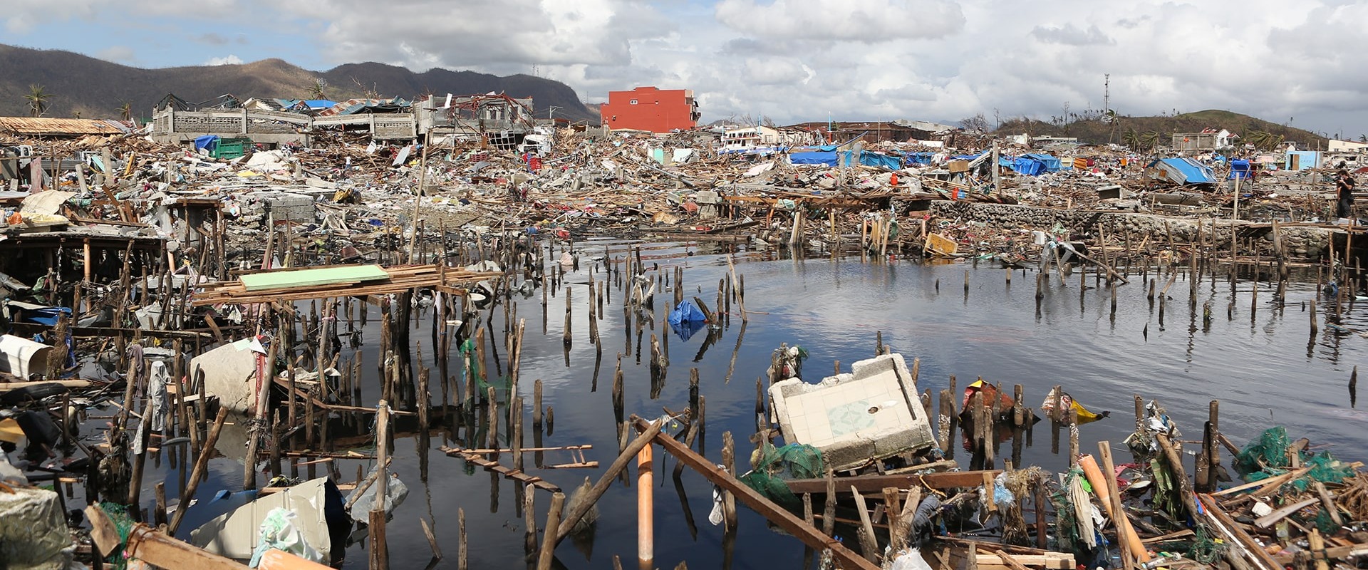 Devastating damage from Typhoon Haiyan or Yolanda in the Philippines, by ymphotos
