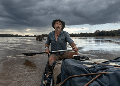 Steve Boyes canoes through the North Luangwa National Park in Zambia, photo by James Kydd